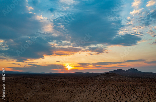 sunset over the desert © FroZone