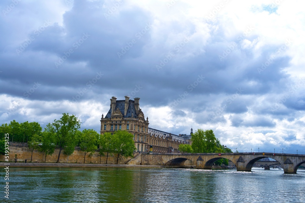 panorama of the embankment of the Seine and the Louvre in Paris