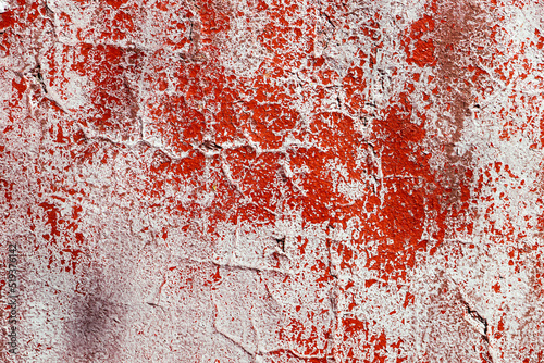 Abstract texture of plaster and red paint, aged plaster texture, abstract