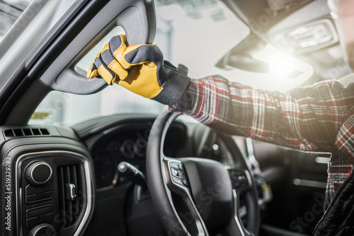 Holding the Car Handle with a Hand in Gloves