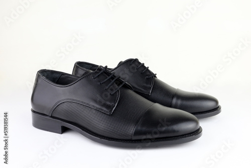 Black leather man shoes isolated on white background
