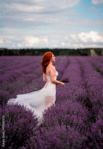 Girl in a white dress in a lavender field summer 2022