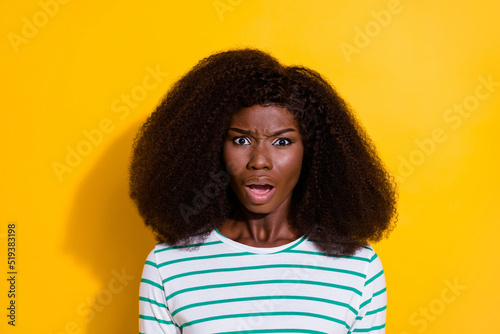 Photo of impressed unsatisfied girl open mouth stare speechless cant believe isolated on yellow color background © deagreez