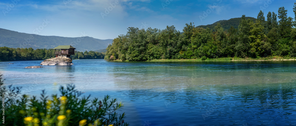 Drina river with famous house on the rock at summer panorama, travel to Serbia