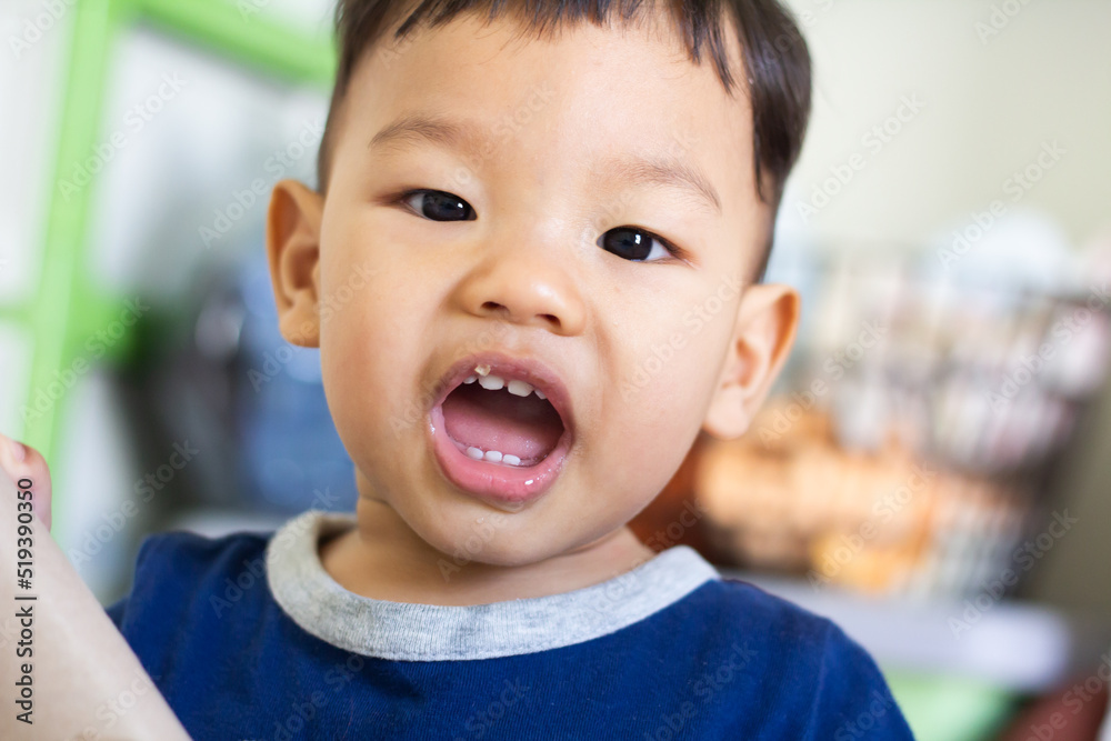 young boy cheeky smile open mouth show front teeth, boy doing comedy show young boy cheeky smile open mouth show front teeth, boy doing comedy show
