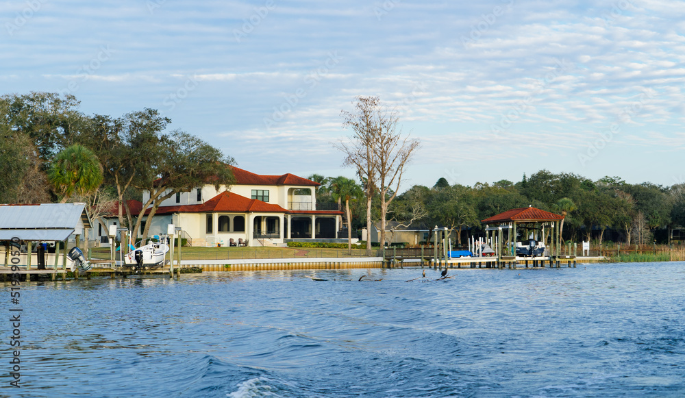 Riverview, Florida, USA - 02 10 2022:  River view house and dock along Little Manatee River 