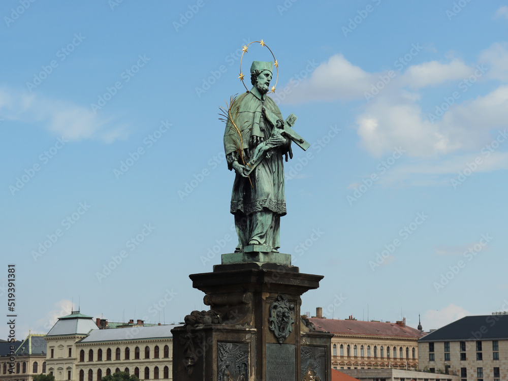 Historical  religious statues on Charles Bridge in Prague - the capital city of Czech Republic.