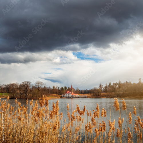 May storm at the ancient Maltese castle. Spring sunny landscape in the ancient Russian city of Gatchina. Russia