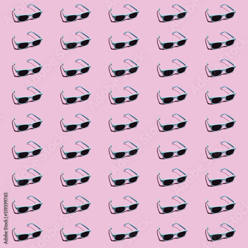Modern summer hipster seamless pattern with pastel blue sunglasses on pink background