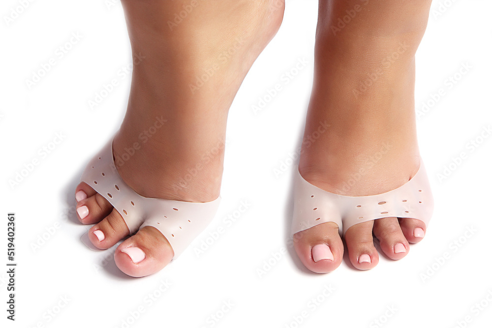 Silicone corrector for toes on a black background Silicone corrector for toes on a black background