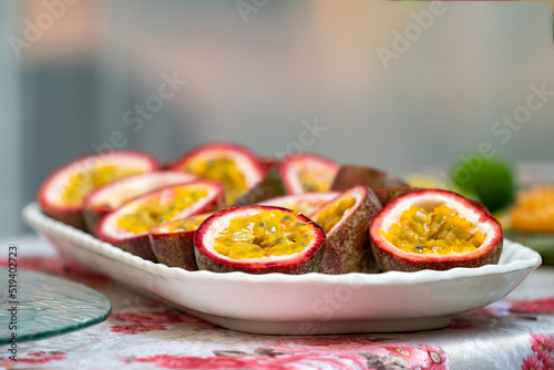 the Half of Passion Fruit on the dish  ready to serve and eat.