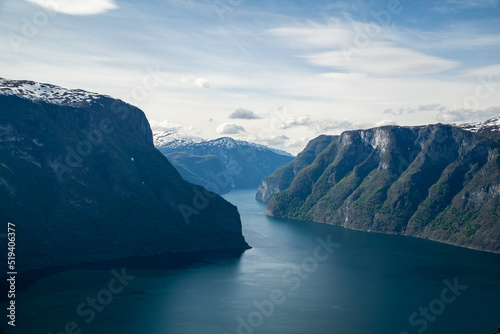 Beautiful Naerofjord with high mountains and waterfall in Norway