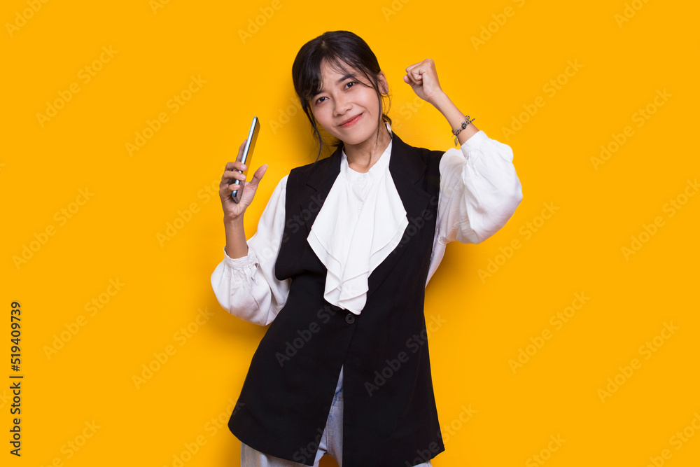 happy young asian beautiful woman using mobile phone isolated on yellow background
happy young asian beautiful woman using mobile phone isolated on yellow background