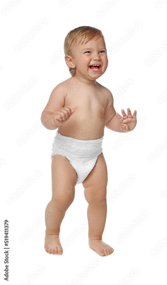 Cute baby in diaper learning to walk on white background Cute baby in diaper learning to walk on white background