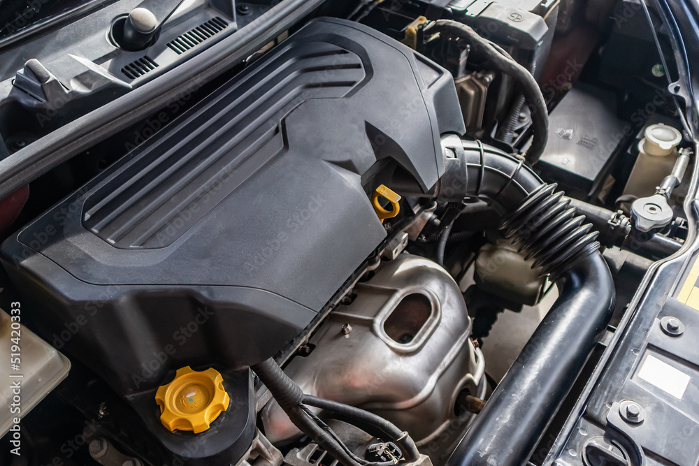 Fototapeta premium car engine under hood close up detail