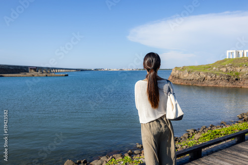 Woman look at the sea view in Penghu of Taiwan © leungchopan