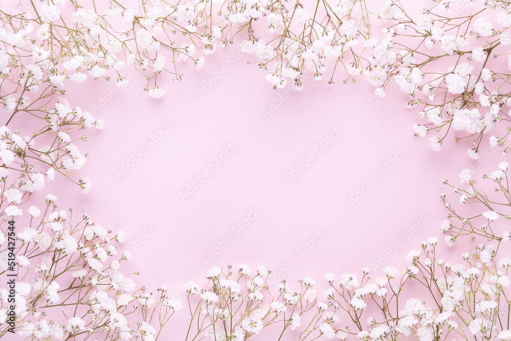 Obraz premium Beautiful flower background of pink gypsophila flowers. Flat lay, top view. Floral pattern.