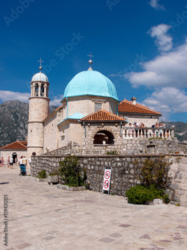 Beautiful view of the artificial island Gospa od krpjela, Our Lady of the Rocks, Roman Catholic Church, Perast, Bay of Kotor, Montenegro photo
