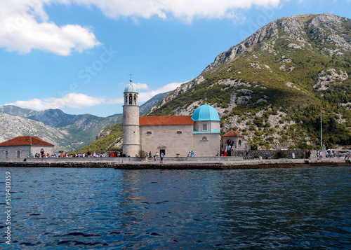 Beautiful view of the artificial island Gospa od krpjela, Our Lady of the Rocks, Roman Catholic Church, Perast, Bay of Kotor, Montenegro photo