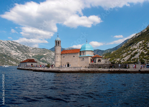 Beautiful view of the artificial island Gospa od krpjela, Our Lady of the Rocks, Roman Catholic Church, Perast, Bay of Kotor, Montenegro photo