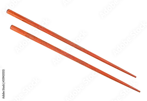 Wooden chopsticks isolated on a white background. Brown color. photo
