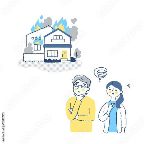 困った表情の男女と火災にあった家