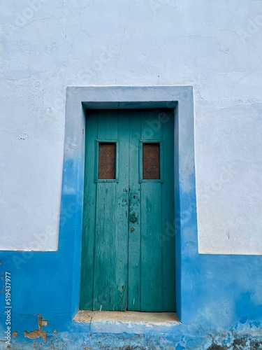 old blue door in Lagos, Algarve, Portugal © Raphalle