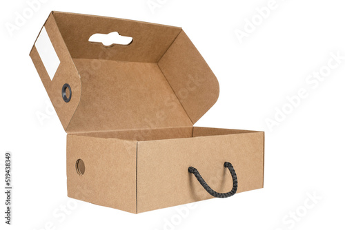 Corrugated cardboard box with a ventilation hole and a handle for packing shoes. An open cardboard box on a white background. For advertising