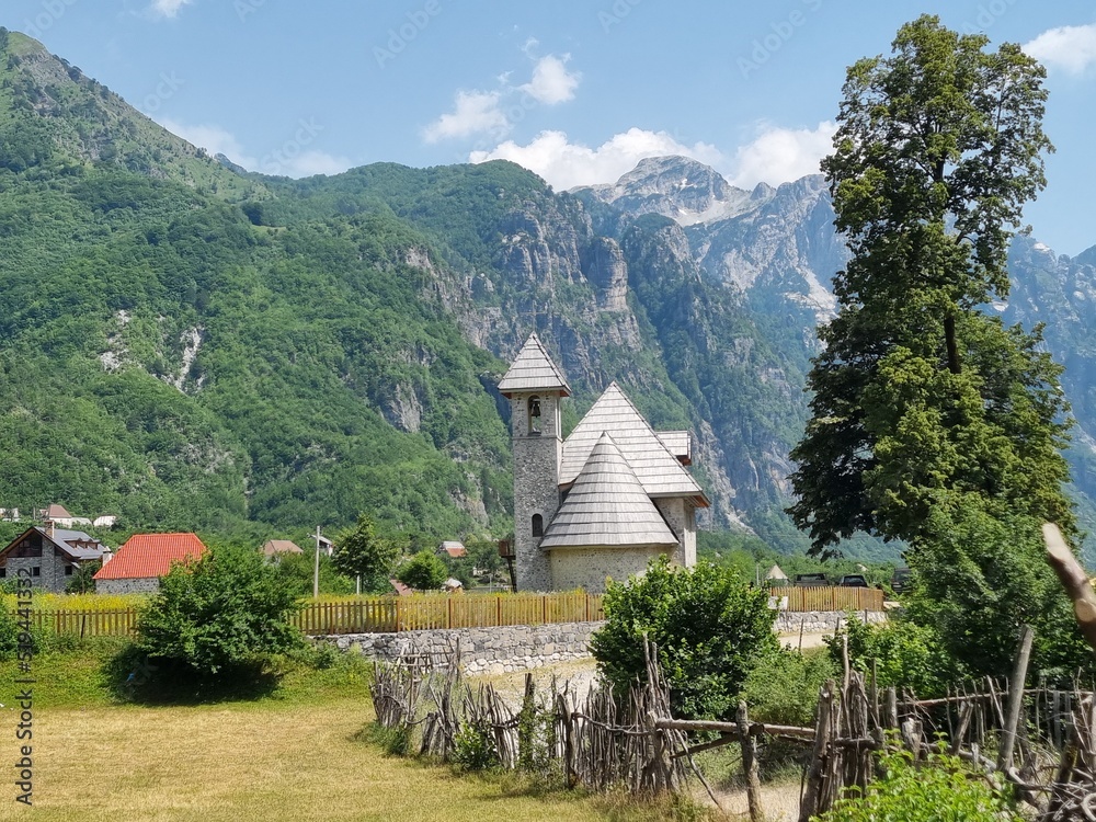 village with church in the mountains in Albania