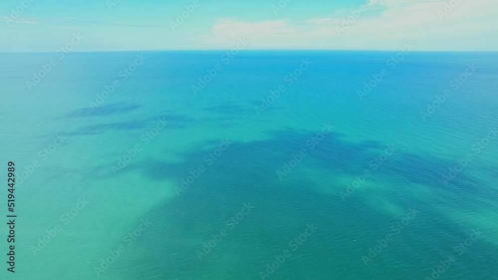 An aerial view over the sea reflecting the beautiful sky and clouds. Nature background in 4K resolution. Phetchaburi, Thailand
An aerial view over the sea reflecting the beautiful sky and clouds. Nature background in 4K resolution. Phetchaburi, Thailand