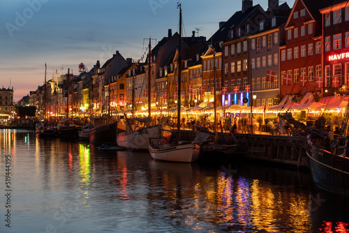 Nyhavn canal with sunset view It is a sightseeing and entertainment district with old ships and colorful houses from the 17th and early 18th centuries. 20 July 2022 Copenhagen  Denmark 