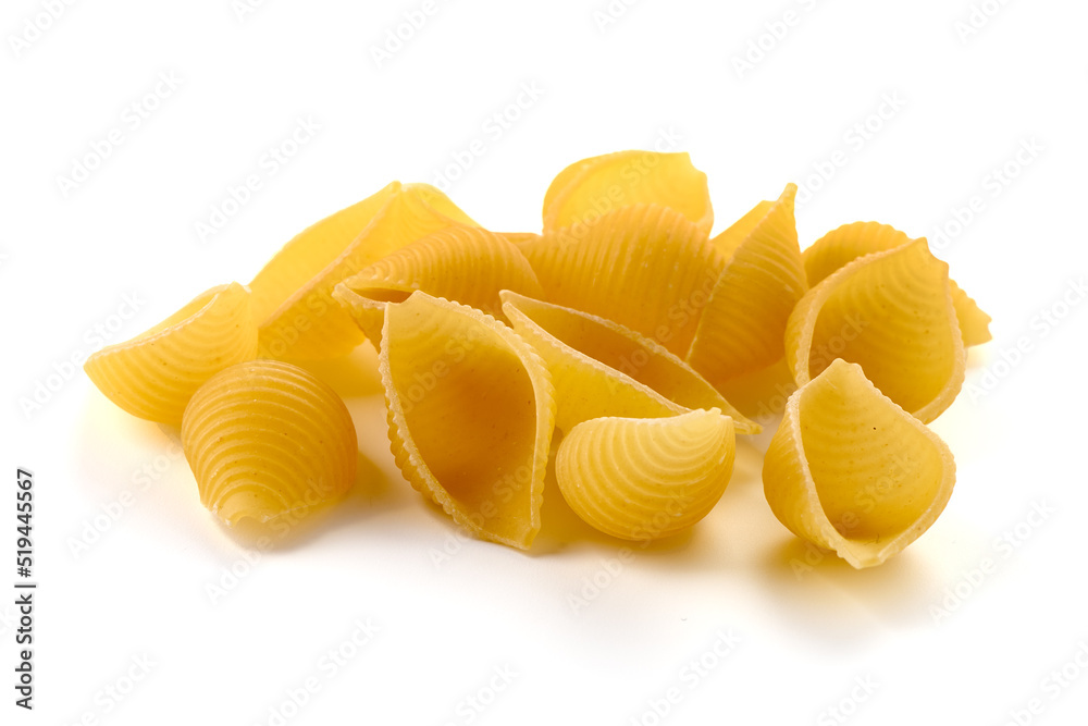 Conchiglie rigate. Raw striped shell pasta, isolated on white background. Conchiglie rigate. Raw striped shell pasta, isolated on white background.