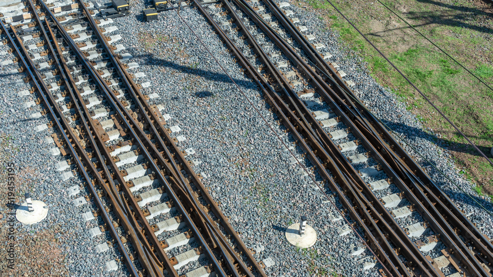 Top perspective view on many railway track lines. Railway, railroad track. Cargo and journey concepts.