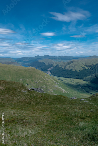 Wallpaper Mural View of mountain peaks in the Trossachs National Park from the top of a hill.  Beautiful lush green summer mountainous landscape in Scotland Torontodigital.ca