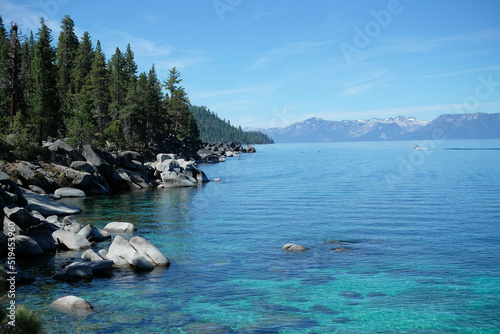 The beautiful view of Lake Tahoe , the blue water and a blue sky with a Mountain.