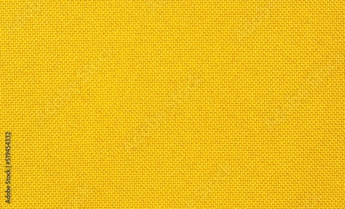 seamless yellow fabric texture for background. Fabric background. photo