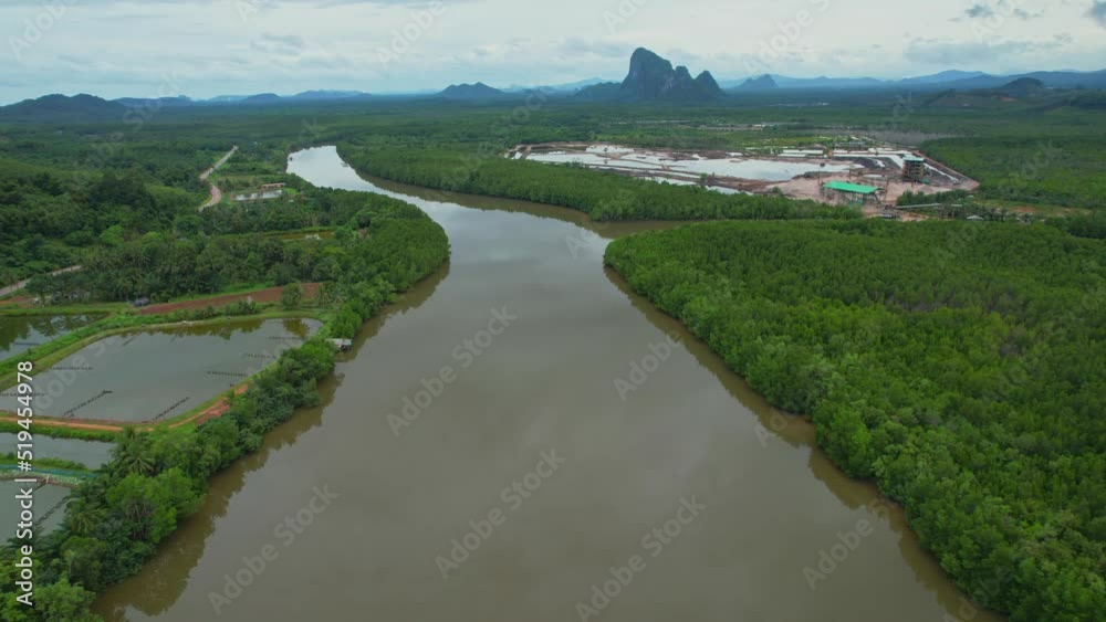 Aerial view over the harbor and fishing villages, Sandbars and large mangrove forests. Pak Nam Tako, Chumphon, Southern, Thailand. 4k. drone
Aerial view over the harbor and fishing villages, Sandbars and large mangrove forests. Pak Nam Tako, Chumphon, Southern, Thailand. 4k. drone