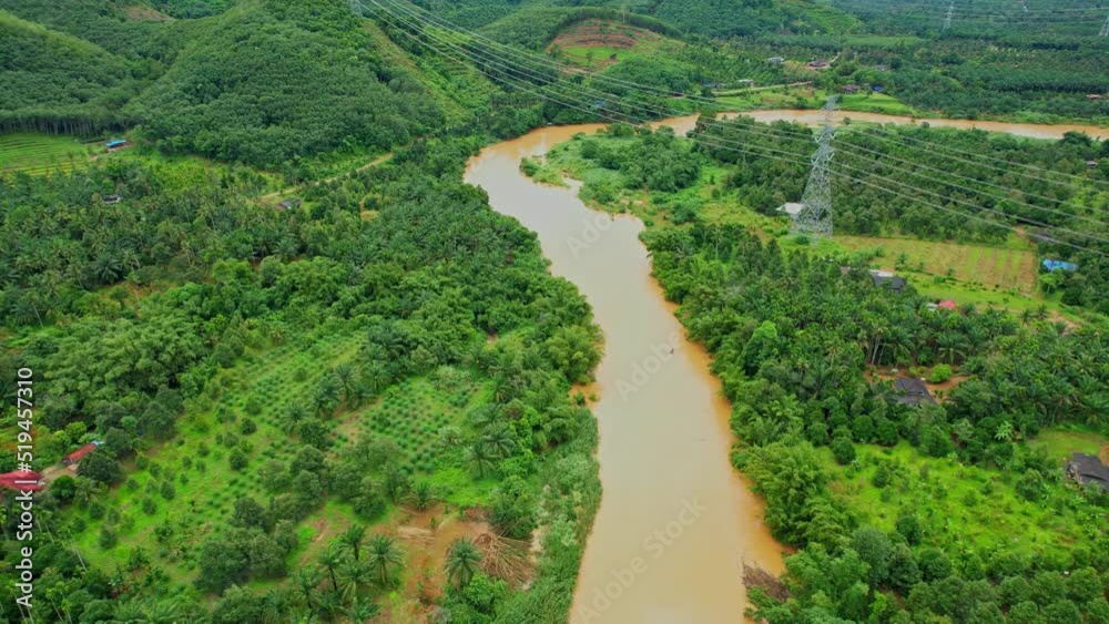 4K : Aerial view over farmland and hill farming. meandering river channel. Tropical environment. Agriculture in Chumphon Province, Southern of Thailand.
4K : Aerial view over farmland and hill farming. meandering river channel. Tropical environment. Agriculture in Chumphon Province, Southern of Thailand.