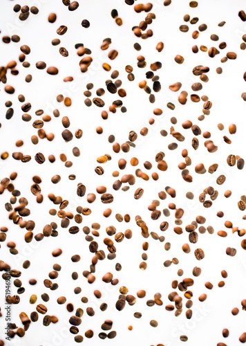 coffee beans in various planes on white background.