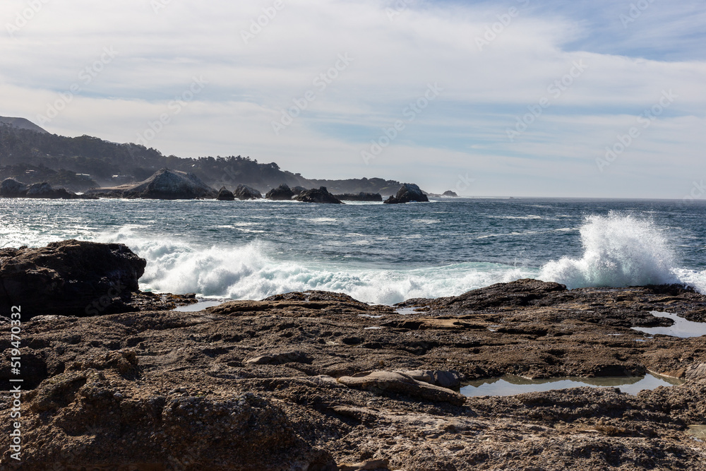 A view on Pacific ocean with rocks and waves A view on Pacific ocean with rocks and waves