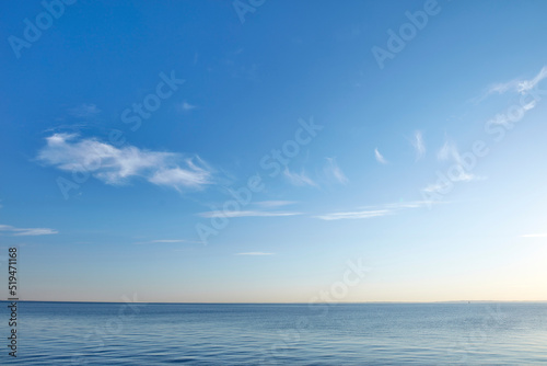 Beautiful  calm and quiet view of the beach  ocean and sea against a blue sky copy space background on a sunny day outside. Peaceful  scenic and tranquil landscape to enjoy a relaxing coastal getaway