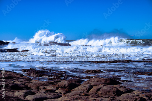 Beach waves crashing to shore