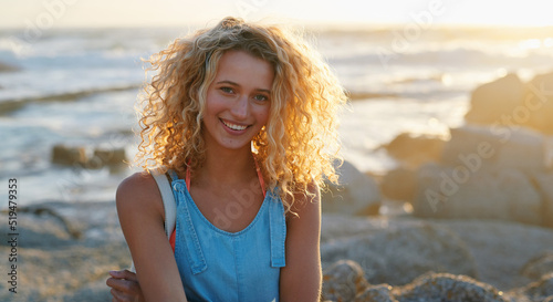 Canvas Print portrait attractive blonde woman on beach at sunset smiling enjoying summer trav