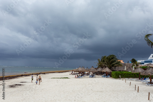 A beach and ocean before tropical thunderstorm