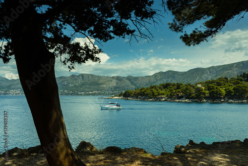 Wallpaper Mural Sea landscape, Adriatic Sea, Croatia, mountains  in the horizon, a small sailboat sets out from the bay to the sea Torontodigital.ca