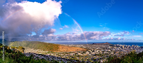 rainbow over honolulu hawaii after rain