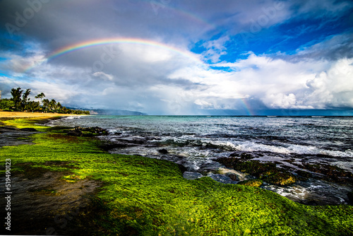Photography Rainbow over the popular surfing place Sunset Beach , Oahu, Hawaii