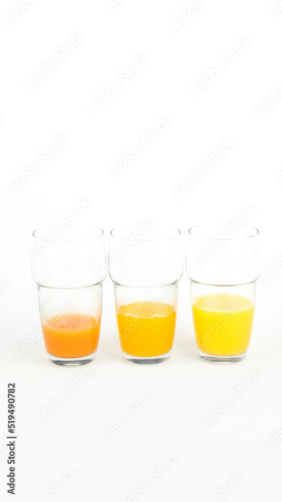 Fruit juices assortment on light background.