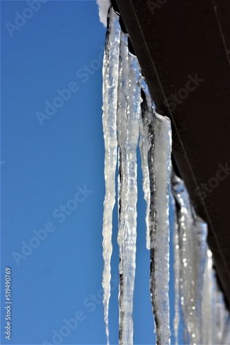 Icicles with blue sky background