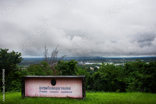 View cityscape Mae Chan city hill village valley and landscape mountain Tham Luang Nang Non Cave at viewpoint for thai people and foreign travelers travel visit on June 30, 2022 in Chiang Rai Thailand photo